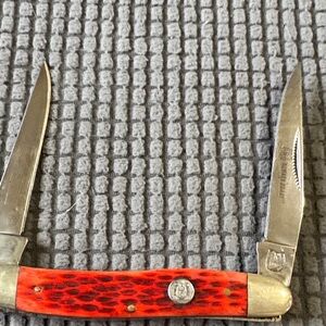 Rough Rider Red Jigged Bone Pocket Knife with Brass Bolsters